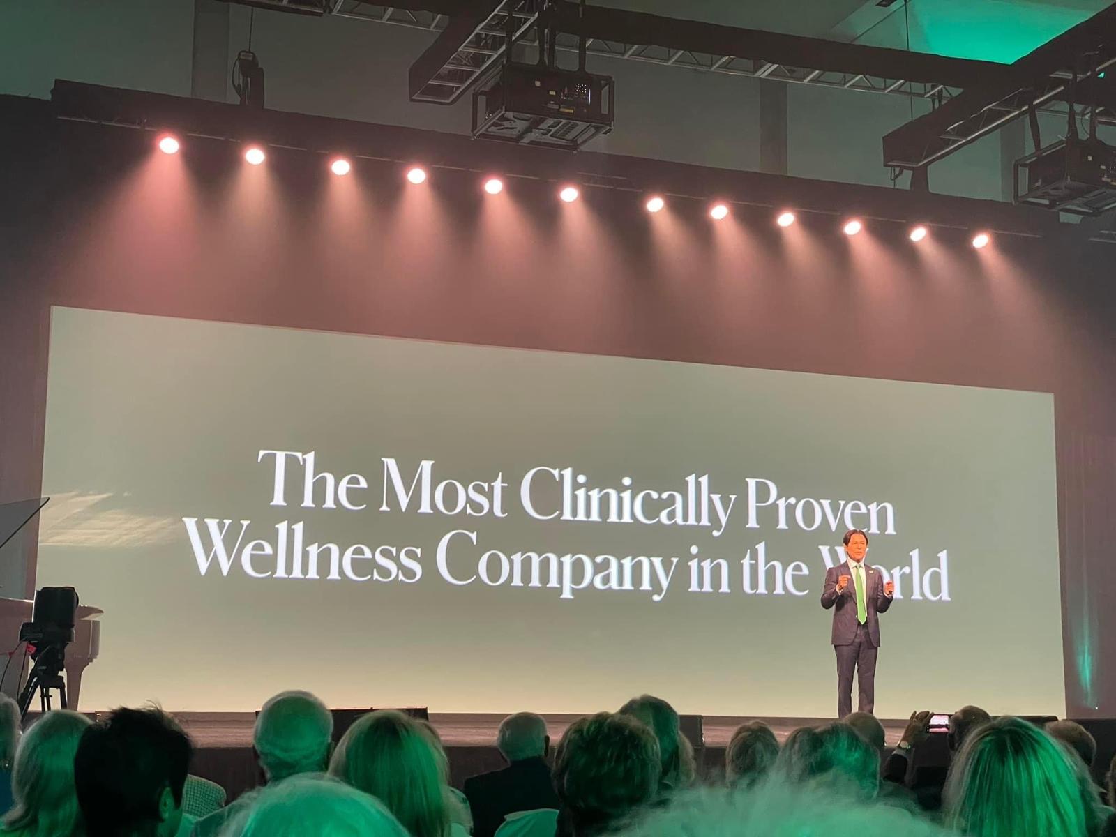 Shaklee's CEO on stage