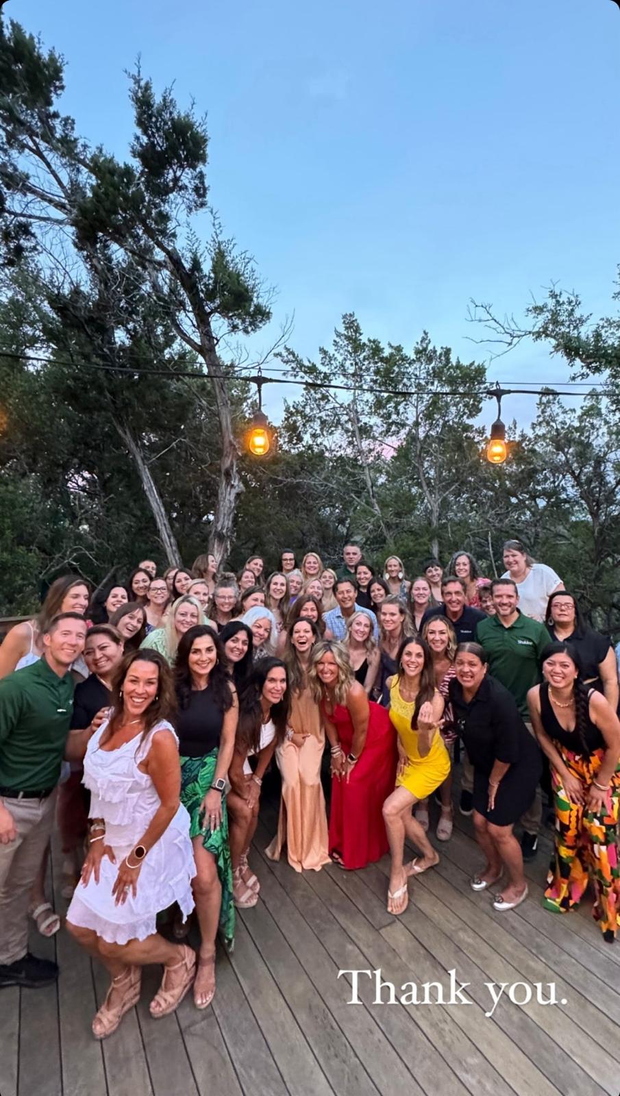 Group photo outdoors in the evening